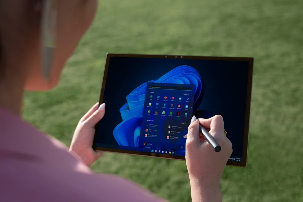 a person holding a tablet