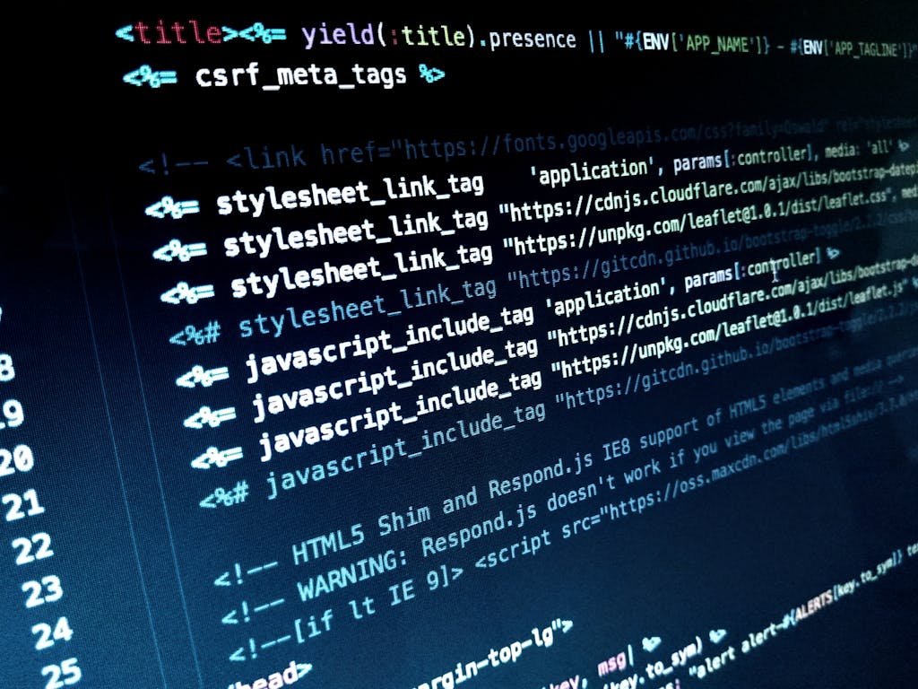 Detailed view of HTML and JavaScript code displayed on a computer monitor.