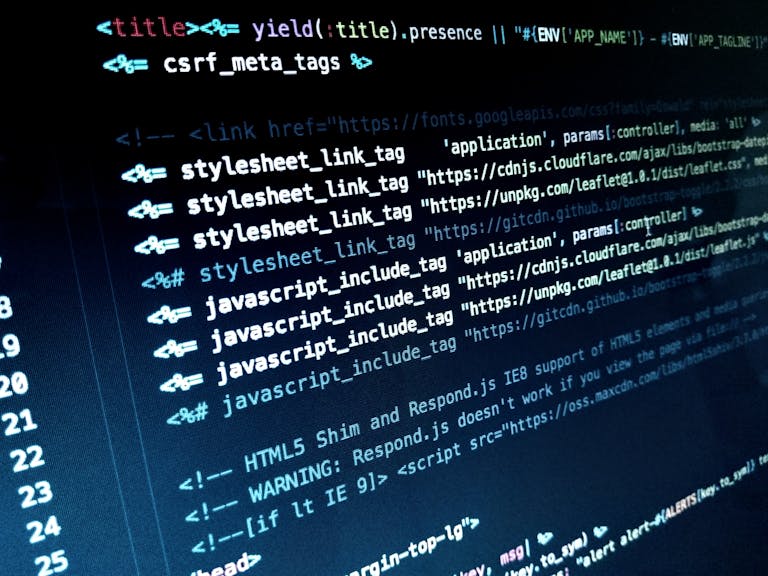 Detailed view of HTML and JavaScript code displayed on a computer monitor.
