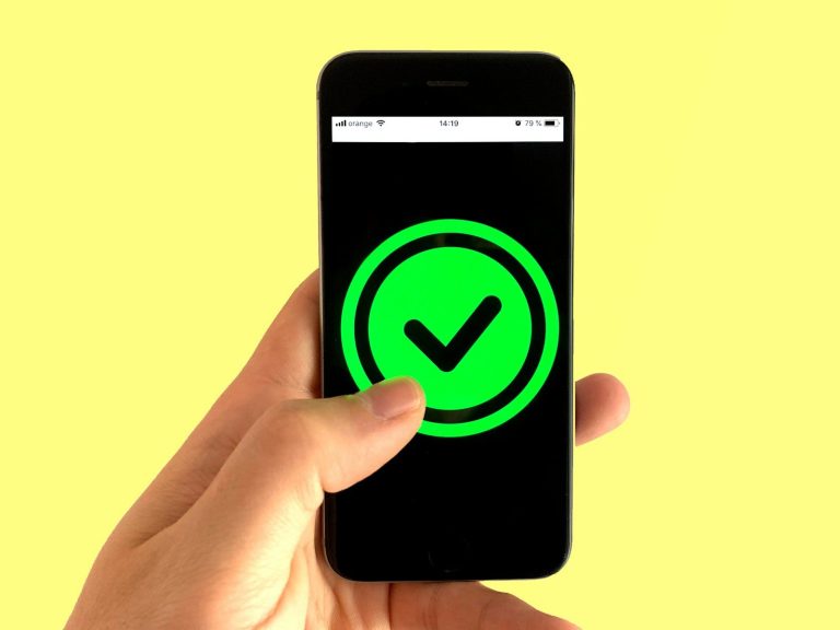 black android smartphone displaying green and black logo