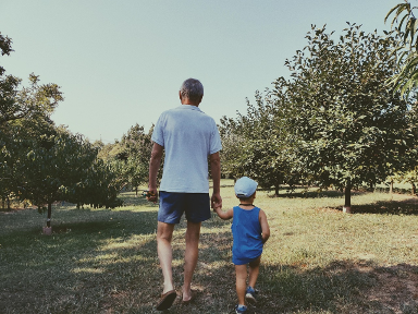 father walking with son