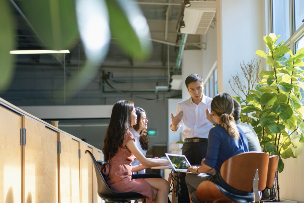 Founders in a sunlit space exploring an open bank account service in Hong Kong presented by Asia Business Centre | AsiaBC